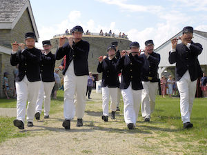 Musical ensemble playing while marching.